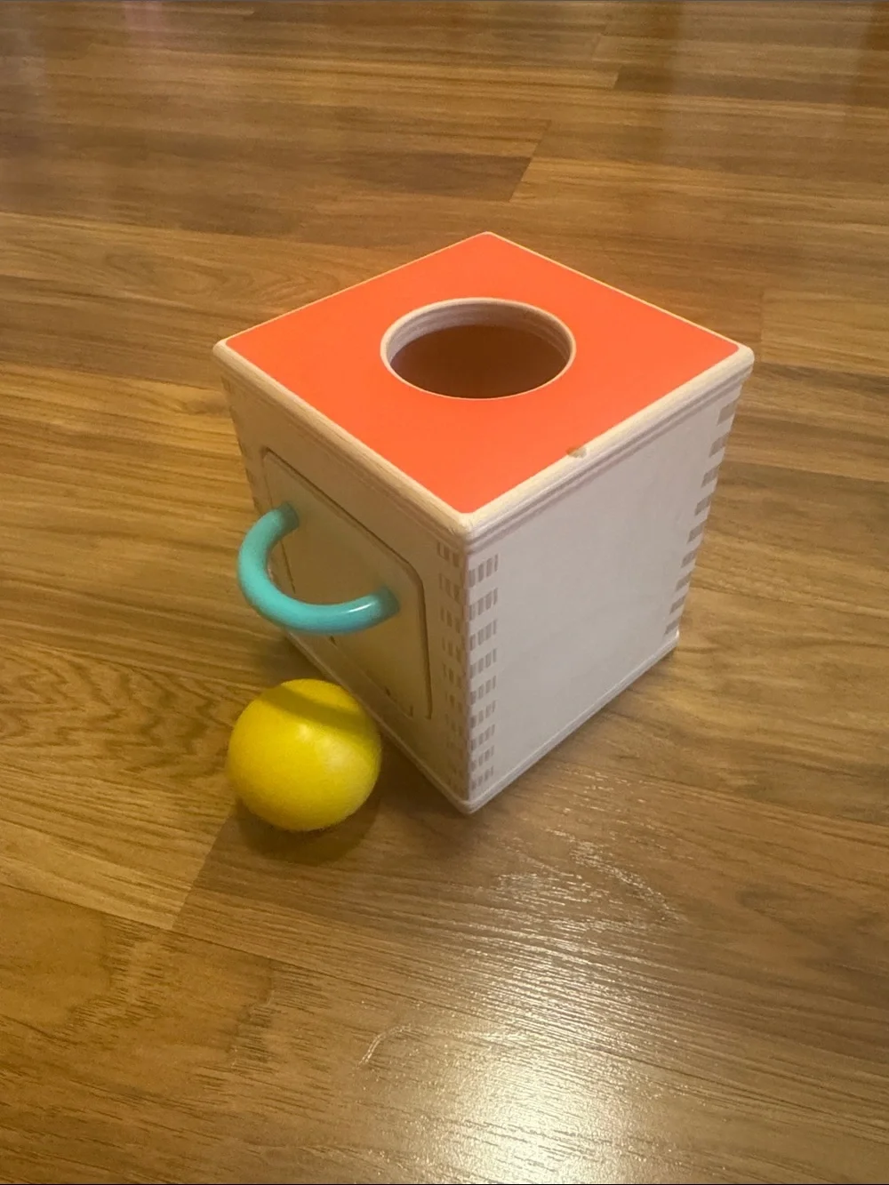 Lovevery Wooden Cube Toy Box with Orange Top and Teal Handle